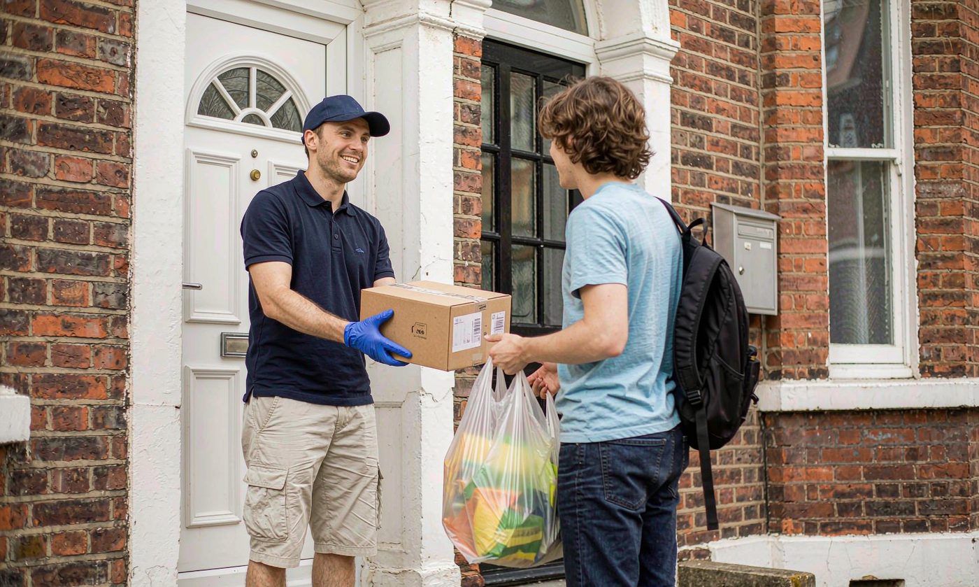 Services Parcel handover at a British doorstep